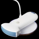 Suresult C5SH convex ultrasound probe on its wireless charging pad