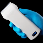 Suresult L10H wireless linear probe in a clinician's gloved hand