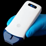 Suresult L14 wireless linear probe in a clinician's gloved hand